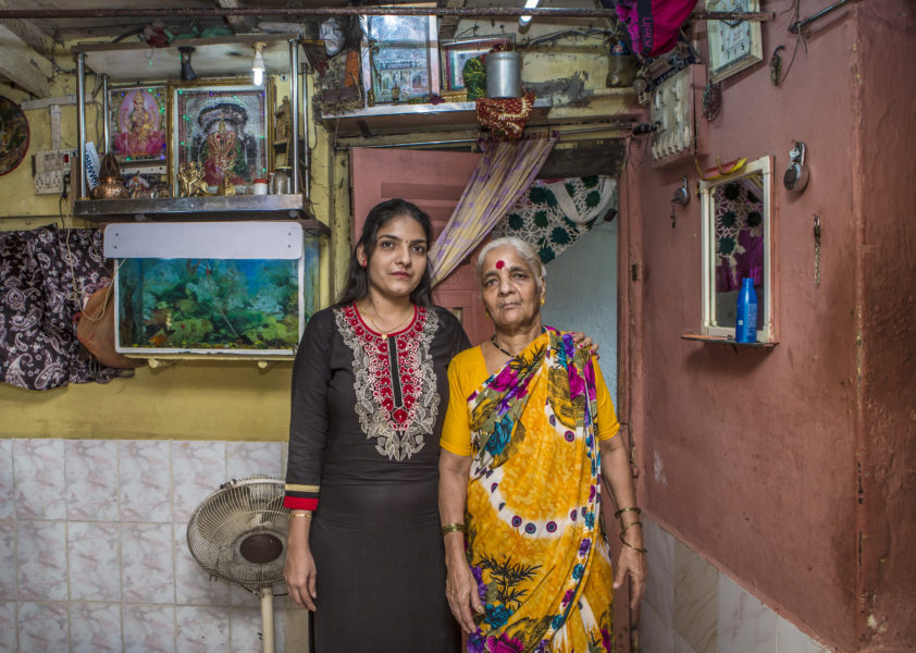 Aarti Naik changemaker in Generation Share, founder of the Sakhi School for Girls Education pictured with her mother 
in their one-room slum in Muland, Mumbai.